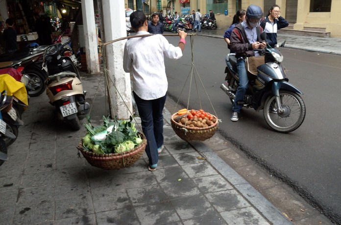 Woman Carrying Goods